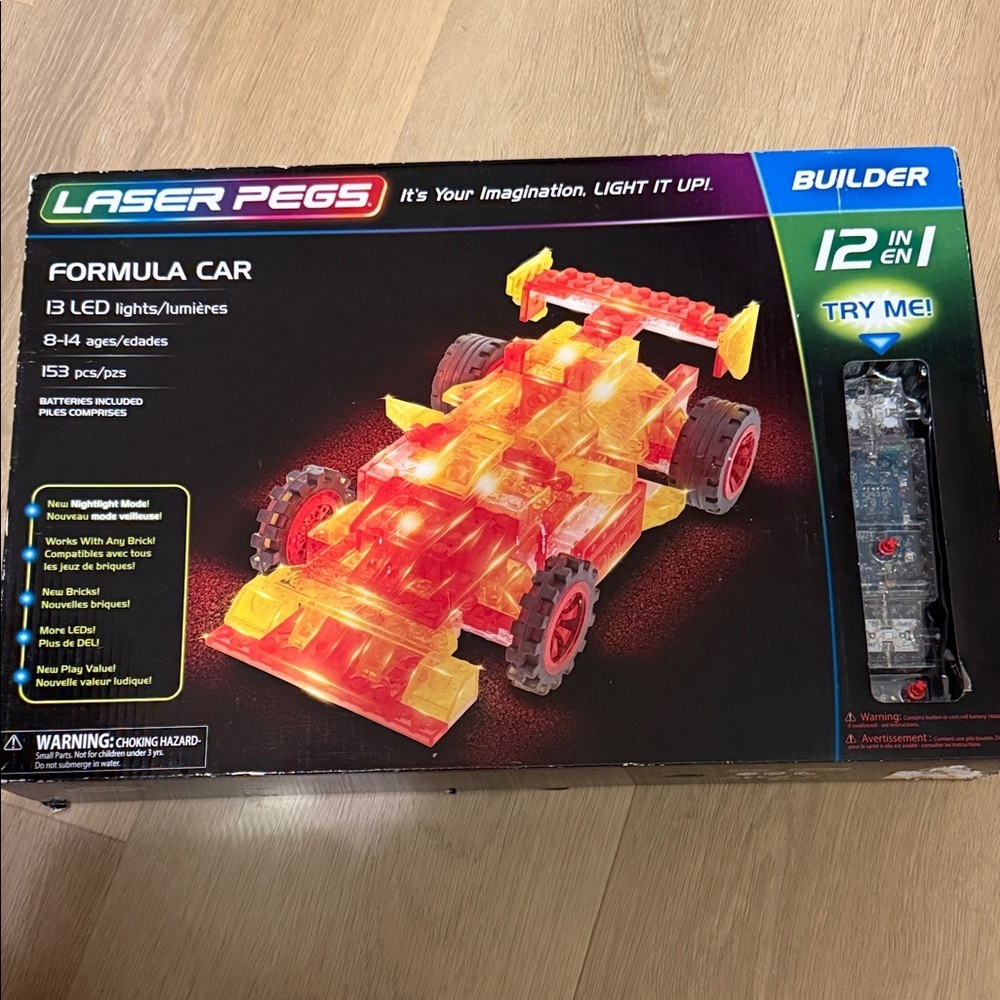Laser pegs 12 in 1 formula car 13 LED lights and 153 pieces new in sealed box